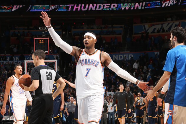 OKLAHOMA CITY, OK - DECEMBER 5:  Carmelo Anthony #7 of the Oklahoma City Thunder celebrates on the court after the game against the Utah Jazz on December 5, 2017 at Chesapeake Energy Arena in Oklahoma City, Oklahoma. NOTE TO USER: User expressly acknowledges and agrees that, by downloading and or using this photograph, User is consenting to the terms and conditions of the Getty Images License Agreement. Mandatory Copyright Notice: Copyright 2017 NBAE (Photo by Layne Murdoch/NBAE via Getty Images)