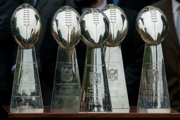New England Patriots Lombardi trophies displayed on a table during a ceremony on the South Lawn of the White House in Washington, Wednesday, April 19, 2017, where the president honored the Super Bowl Champion New England Patriots for their Super Bowl LI victory. (AP Photo/Andrew Harnik)