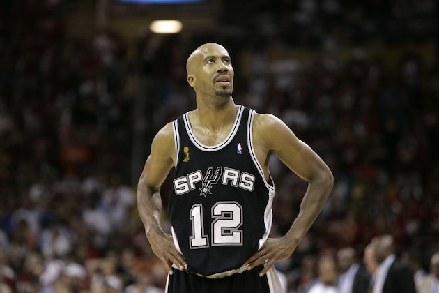 San Antonio Spurs' Bruce Bowen looks at the score board in Game 3 of the NBA basketball finals Tuesday, June 12, 2007, in Cleveland. (AP Photo/Eric Gay)