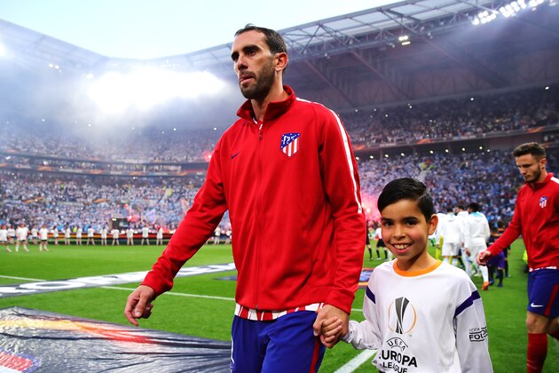 LYON, FRANCE - MAY 16: Diego Godin of Club Atletico de Madrid walks out before the UEFA Europa League Final between Olympique de Marseille and Club Atletico de Madrid at Stade de Lyon on May 16, 2018 in Lyon, France.  (Photo by Chris Brunskill Ltd/Getty Images)