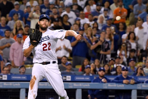 LOS ANGELES, CA - AUGUST 13:  Clayton Kershaw #22 of the Los Angeles Dodgers throws out Hunter Pence #8 of the San Francisco Giants to end the eighth inning at Dodger Stadium on August 13, 2018 in Los Angeles, California.  (Photo by Harry How/Getty Images)