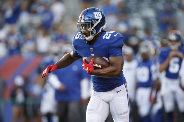 New York Giants running back Saquon Barkley (26) warms up before a preseason NFL football game against the Cleveland Browns Thursday, Aug. 9, 2018, in East Rutherford, N.J. (AP Photo/Adam Hunger)