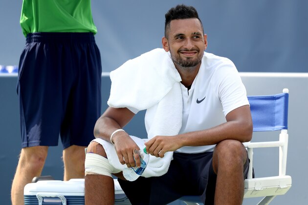 MASON, OH - AUGUST 14:  Nick Kyrgios of Austraila cools down between games while playing Denis Kudla during the Western & Southern Open at Lindner Family Tennis Center on August 14, 2018 in Mason, Ohio.  (Photo by Matthew Stockman/Getty Images)