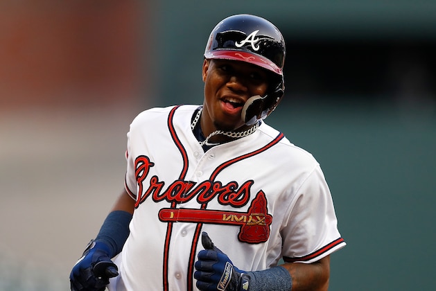 ATLANTA, GA - AUGUST 13:  Ronald Acuna Jr. #13 of the Atlanta Braves rounds second base after hitting a solo homer to lead off game two of a doubleheader against the Miami Marlins at SunTrust Park on August 13, 2018 in Atlanta, Georgia.  (Photo by Kevin C. Cox/Getty Images)