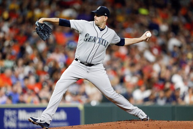 HOUSTON, TX - AUGUST 09:  James Paxton #65 of the Seattle Mariners pitches in the first inning against the Houston Astros at Minute Maid Park on August 9, 2018 in Houston, Texas.  (Photo by Bob Levey/Getty Images)