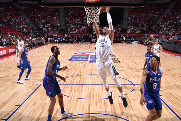 LAS VEGAS, NV - JULY 14: Christian Wood #35 of the Milwaukee Bucks dunks the ball against the Philadelphia 76ers during the 2018 Las Vegas Summer League on July 14, 2018 at the Thomas & Mack Center in Las Vegas, Nevada. NOTE TO USER: User expressly acknowledges and agrees that, by downloading and/or using this photograph, user is consenting to the terms and conditions of the Getty Images License Agreement. Mandatory Copyright Notice: Copyright 2018 NBAE (Photo by Garrett Ellwood/NBAE via Getty Images)
