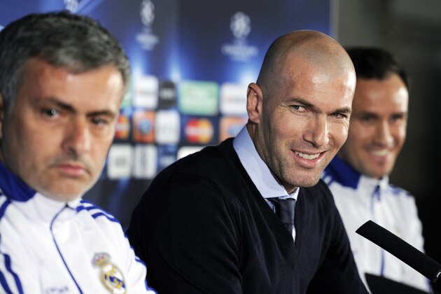 Former French football player Zinedine Zidane speaks near Real Madrid's Portuguese coach Jose Mourinho (L) during a press conference on the eve of UEFA Champions league football match Lyon versus Real Madrid on February 21, 2011 at the Gerland stadium in LyonAFP PHOTO/PHILIPPE DESMAZES (Photo credit should read PHILIPPE DESMAZES/AFP/Getty Images)