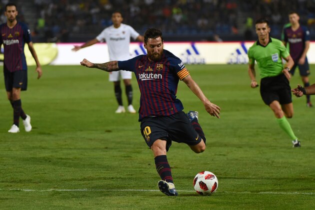 Barcelona's Argentinian forward Lionel Messi prepares to kick the ball during the Spanish Super Cup final between Sevilla and FC Barcelona at Ibn Batouta stadium in the Moroccan city of Tangiers on August 12, 2018. (Photo by FADEL SENNA / AFP)        (Photo credit should read FADEL SENNA/AFP/Getty Images)