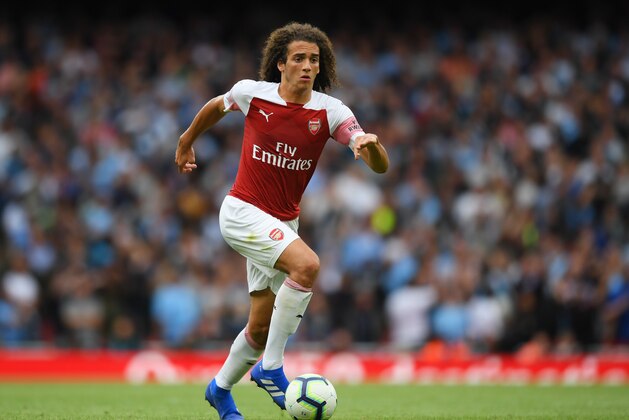 LONDON, ENGLAND - AUGUST 12:  Matteo Guendouzi of Arsenal runs with the ball during the Premier League match between Arsenal FC and Manchester City at Emirates Stadium on August 12, 2018 in London, United Kingdom.  (Photo by Shaun Botterill/Getty Images)