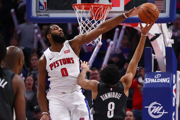 DETROIT, MI - JANUARY 21: Spencer Dinwiddie #8 of the Brooklyn Nets makes the game winning shot around Andre Drummond #0 of the Detroit Pistons at Little Caesars Arena on January 21, 2018 in Detroit, Michigan. Brooklyn won the game 101-100. NOTE TO USER: User expressly acknowledges and agrees that, by downloading and or using this photograph, User is consenting to the terms and conditions of the Getty Images License Agreement. (Photo by Gregory Shamus/Getty Images)