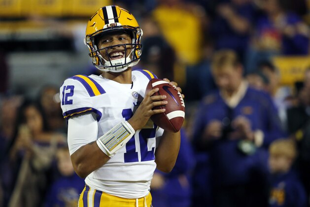 LSU quarterback Justin McMillan (12) warms up before an NCAA college football game against Texas A&M in Baton Rouge, La., Saturday, Nov. 25, 2017. (AP Photo/Gerald Herbert)