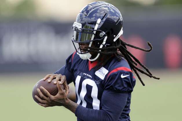 Houston Texans wide receiver DeAndre Hopkins catches a pass during an NFL football minicamp practice Tuesday, June 12, 2018, in Houston. (AP Photo/David J. Phillip)