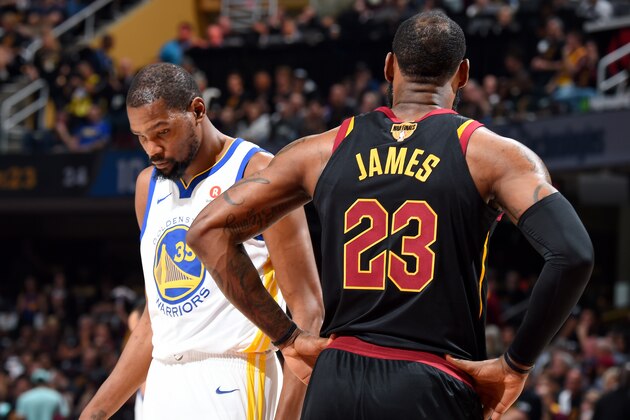 CLEVELAND, OH - JUNE 8: LeBron James #23 of the Cleveland Cavaliers and Kevin Durant #35 of the Golden State Warriors looks on during Game Four of the 2018 NBA Finals on June 8, 2018 at Quicken Loans Arena in Cleveland, Ohio. NOTE TO USER: User expressly acknowledges and agrees that, by downloading and or using this Photograph, user is consenting to the terms and conditions of the Getty Images License Agreement. Mandatory Copyright Notice: Copyright 2018 NBAE (Photo by Andrew D. Bernstein/NBAE via Getty Images)