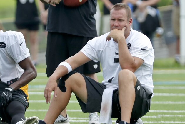 Pittsburgh Steelers quarterback Ben Roethlisberger sits on his helmet at practice during NFL football training camp in Latrobe, Pa., Tuesday, Aug. 7, 2018 . (AP Photo/Keith Srakocic)