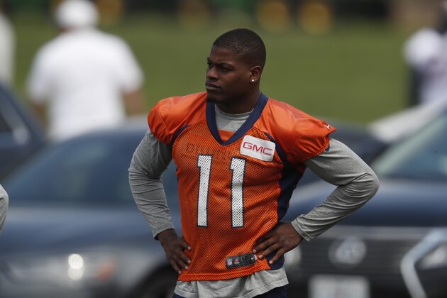 Denver Broncos wide receiver Carlos Henderson (11) takes part in drills at the NFL football team's training camp Thursday, June 14, 2018, in Englewood, Colo. (AP Photo/David Zalubowski)
