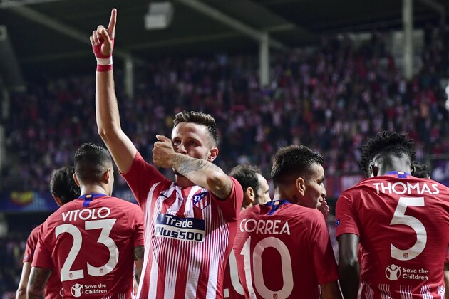 Atletico Madrid's Spanish midfielder Saul Niguez (C) celebrates with teammates after scoring a goal during the UEFA Super Cup football match between Real Madrid and Atletico Madrid at the Lillekula Stadium in the Estonian capital Tallinn on August 15, 2018. (Photo by JAVIER SORIANO / AFP)        (Photo credit should read JAVIER SORIANO/AFP/Getty Images)