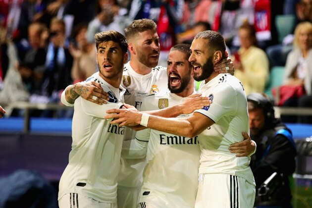 TALLINN, ESTONIA - AUGUST 15:  Karim Benzema of Real Madrid celebrates scoring his sides first goal with his team during the UEFA Super Cup between Real Madrid and Atletico Madrid at Lillekula Stadium on August 15, 2018 in Tallinn, Estonia.  (Photo by Chris Brunskill/Fantasista/Getty Images)
