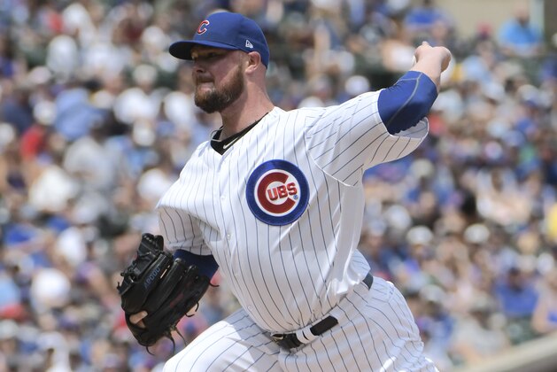 Chicago Cubs starting pitcher Jon Lester (34) throws the ball against the San Diego Padres during the first inning of a baseball game, Sunday, Aug. 5, 2018, in Chicago. (AP Photo/David Banks)