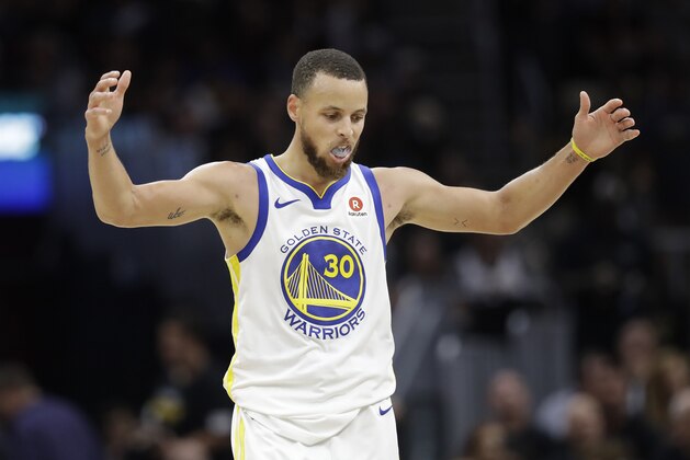 Golden State Warriors' Stephen Curry celebrates in the second half of Game 4 of basketball's NBA Finals against the Cleveland Cavaliers, Friday, June 8, 2018, in Cleveland. (AP Photo/Tony Dejak)