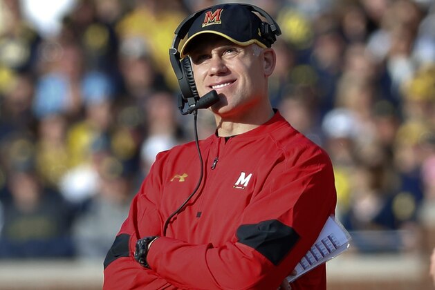 Maryland Terrapins head coach DJ Durkin looks on against the Michigan Wolverines in the first half of an NCAA college football game in Ann Arbor, Mich., Saturday, Nov. 5, 2016. (AP Photo/Paul Sancya)