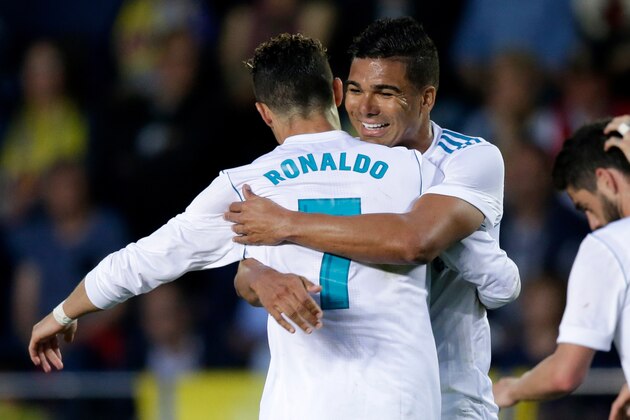 CASTELLON, SPAIN - MAY 19: Cristiano Ronaldo of Real Madrid celebrates 0-2 with Casemiro of Real Madrid  during the La Liga Santander  match between Villarreal v Real Madrid at the Estadio de la Ceramica on May 19, 2018 in Castellon Spain (Photo by Jeroen Meuwsen/Soccrates/Getty Images)