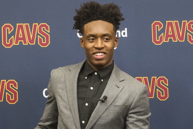 Cleveland Cavaliers NBA basketball team first round draft selection, Collin Sexton, prepares to leave a news conference at the Cavaliers training facility in Independence, Ohio, Friday, June 22, 2018.  (AP Photo/Phil Long)