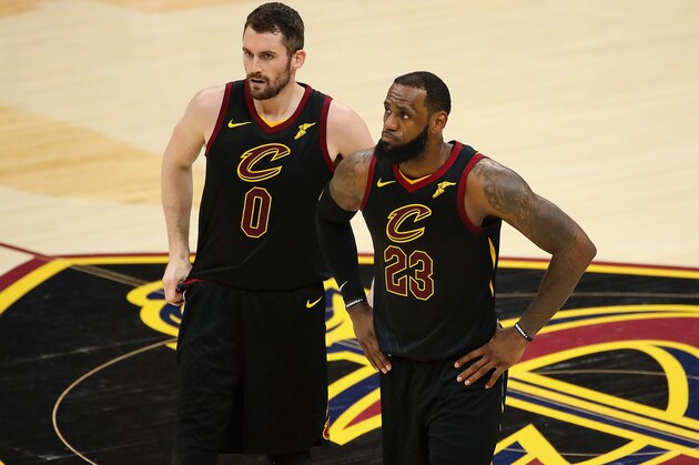 CLEVELAND, OH - MAY 19:  Kevin Love #0 and LeBron James #23 of the Cleveland Cavaliers look on in the first half against the Boston Celtics during Game Three of the 2018 NBA Eastern Conference Finals at Quicken Loans Arena on May 19, 2018 in Cleveland, Ohio. NOTE TO USER: User expressly acknowledges and agrees that, by downloading and or using this photograph, User is consenting to the terms and conditions of the Getty Images License Agreement.  (Photo by Gregory Shamus/Getty Images)
