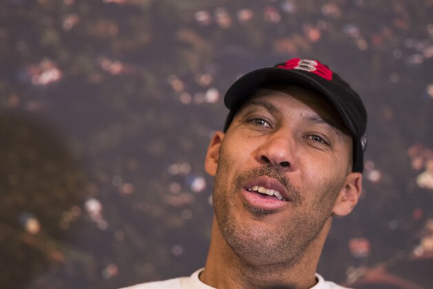 American basketball players LiAngelo and LaMelo's father LaVar Ball speaks during a news conference at the Harmony park hotel in Vaizgaikiemis village, Prienai district, Lithuania, Friday, Jan. 5, 2018.  LiAngelo Ball and LaMelo Ball have both signed a one-year contracts to play for Lithuanian professional basketball club Prienai - Birstonas Vytautas in the southern Lithuania town of Prienai, some 110 km (68 miles) from the Lithuanian capital Vilnius.(AP Photo/Mindaugas Kulbis)