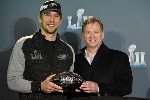 BLOOMINGTON, MN - FEBRUARY 05: NFL Commissioner Roger Goodell poses for a photo with Nick Foles #9 of the Philadelphia Eagles after handing him the Pete Rozelle Trophy as Super Bowl LII MVP during Super Bowl LII media availability on February 5, 2018 at Mall of America in Bloomington, Minnesota. The Philadelphia Eagles defeated the New England Patriots in Super Bowl LII 41-33 on February 4th. (Photo by Hannah Foslien/Getty Images)