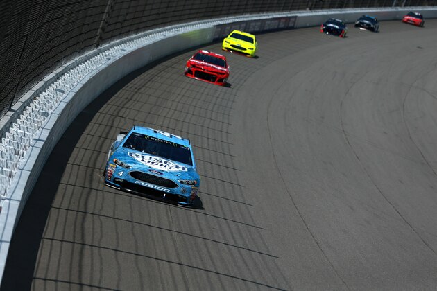 BROOKLYN, MI - AUGUST 12:  Kevin Harvick, driver of the #4 Busch Light/Mobil 1 Ford, leads a pack of cars during the Monster Energy NASCAR Cup Series Consmers Energy 400 at Michigan International Speedway on August 12, 2018 in Brooklyn, Michigan.  (Photo by Sean Gardner/Getty Images)