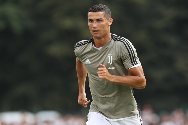 VILLAR PEROSA, ITALY - AUGUST 12:  Cristiano Ronaldo of Juventus during the warm up prior to the Pre-Season Friendly match between Juventus and Juventus U19 on August 12, 2018 in Villar Perosa, Italy.  (Photo by Marco Luzzani/Getty Images)