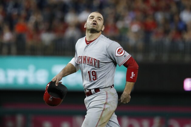 Cincinnati Reds' Joey Votto yells to the Washington Nationals' dugout as he walks off the field during the eighth inning of the second baseball game of a doubleheader at Nationals Park, Saturday, Aug. 4, 2018, in Washington. Votto was hit by a pitch after Washington Nationals' Bryce Harper and Spencer Kieboom were hit by pitches. The Nationals won 6-2. (AP Photo/Alex Brandon)