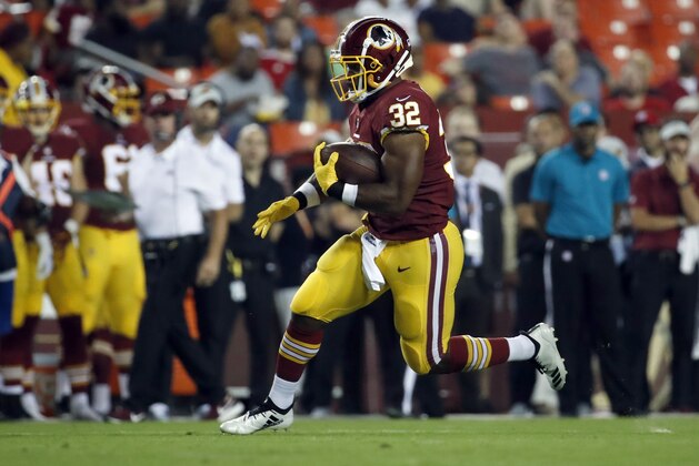Washington Redskins running back Samaje Perine (32) runs with the ball during the first half of a preseason NFL football game against the New York Jets, Thursday, Aug. 16, 2018, in Landover, Md. (AP Photo/Alex Brandon)