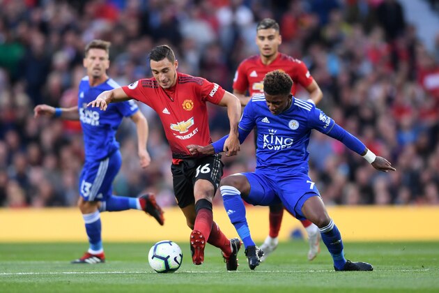 MANCHESTER, ENGLAND - AUGUST 10:  Matteo Darmian of Manchester United and Demarai Gray of Leicester City battle for possession during the Premier League match between Manchester United and Leicester City at Old Trafford on August 10, 2018 in Manchester, United Kingdom.  (Photo by Laurence Griffiths/Getty Images)