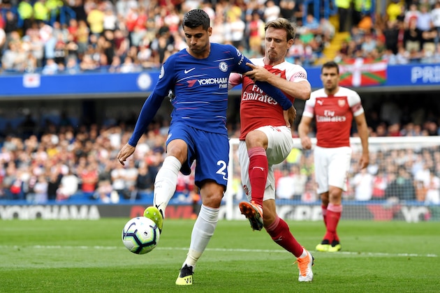 LONDON, ENGLAND - AUGUST 18:  Alvaro Morata of Chelsea and Nacho Monreal of Arsenal battle for possession during the Premier League match between Chelsea FC and Arsenal FC at Stamford Bridge on August 18, 2018 in London, United Kingdom.  (Photo by Shaun Botterill/Getty Images)