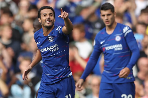 Chelsea's Spanish midfielder Pedro celebrates after scoring the opening goal of the English Premier League football match between Chelsea and Arsenal at Stamford Bridge in London on August 18, 2018. (Photo by Daniel LEAL-OLIVAS / AFP) / RESTRICTED TO EDITORIAL USE. No use with unauthorized audio, video, data, fixture lists, club/league logos or 'live' services. Online in-match use limited to 120 images. An additional 40 images may be used in extra time. No video emulation. Social media in-match use limited to 120 images. An additional 40 images may be used in extra time. No use in betting publications, games or single club/league/player publications. /         (Photo credit should read DANIEL LEAL-OLIVAS/AFP/Getty Images)