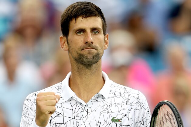 MASON, OH - AUGUST 17:  Novak Djokovic of Serbia celebrates breaking Milos Roanic of Canada in the third set during the Western & Southern Open at Lindner Family Tennis Center on August 17, 2018 in Mason, Ohio.  (Photo by Matthew Stockman/Getty Images)