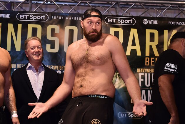 BELFAST, NORTHERN IRELAND - AUGUST 17: Tyson Fury reacts to rival heavyweight boxer Deontay Wilder's taunts during the weigh in for his fight with Francesco Pianeta on August 17, 2018 in Belfast, Northern Ireland. Windsor park will host the Frampton boxing bill on Saturday night which also features Paddy Barnes and Tyson Fury. (Photo by Charles McQuillan/Getty Images)