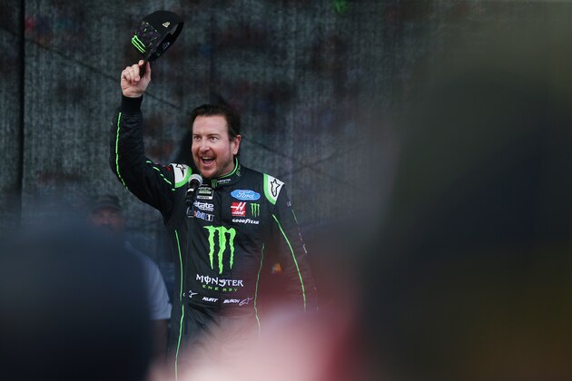 BRISTOL, TN - AUGUST 18: Kurt Busch, driver of the #41 Monster Energy/Haas Automation Ford, speaks to the crowd during introductions prior to the Monster Energy NASCAR Cup Series Bass Pro Shops NRA Night Race at Bristol Motor Speedway on August 18, 2018 in Bristol, Tennessee.  (Photo by Sarah Crabill/Getty Images)