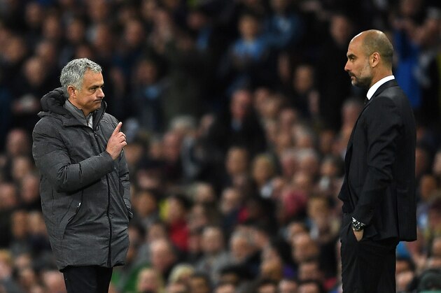 MANCHESTER, ENGLAND - APRIL 27: Jose Mourinho, Manager of Manchester United (L) and Josep Guardiola, Manager of Manchester City (R) during the Premier League match between Manchester City and Manchester United at Etihad Stadium on April 27, 2017 in Manchester, England.  (Photo by Laurence Griffiths/Getty Images)