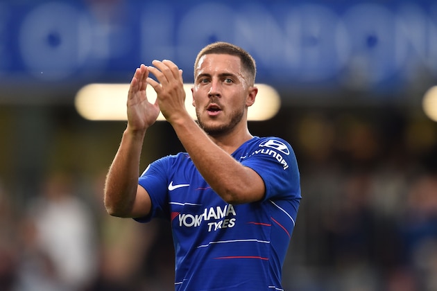 Chelsea's Belgian midfielder Eden Hazard applauds supporters on the pitch after the English Premier League football match between Chelsea and Arsenal at Stamford Bridge in London on August 18, 2018. - Chelsea won the game 3-2. (Photo by Glyn KIRK / AFP) / RESTRICTED TO EDITORIAL USE. No use with unauthorized audio, video, data, fixture lists, club/league logos or 'live' services. Online in-match use limited to 120 images. An additional 40 images may be used in extra time. No video emulation. Social media in-match use limited to 120 images. An additional 40 images may be used in extra time. No use in betting publications, games or single club/league/player publications. /         (Photo credit should read GLYN KIRK/AFP/Getty Images)