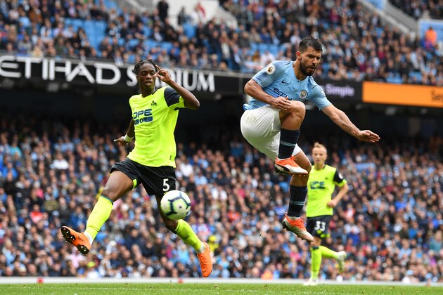 MANCHESTER, ENGLAND - AUGUST 19:  Sergio Aguero of Manchester City scores his team's fifth goal during the Premier League match between Manchester City and Huddersfield Town at Etihad Stadium on August 19, 2018 in Manchester, United Kingdom.  (Photo by Michael Regan/Getty Images)