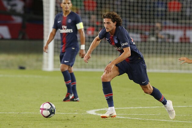 PSG's Adrien Rabiot controls the ball during their League One soccer match between Paris Saint-Germain and Caen at Parc des Princes stadium in Paris, Sunday, Aug. 12, 2018. (AP Photo/Michel Euler)