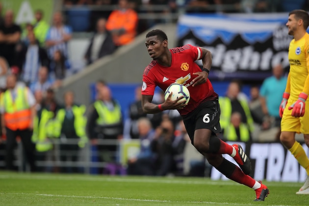 BRIGHTON, ENGLAND - AUGUST 19: Paul Pogba of Manchester United takes the ball and runs after scoring a goal to make it 3-2 during the Premier League match between Brighton & Hove Albion and Manchester United at American Express Community Stadium on August 19, 2018 in Brighton, United Kingdom. (Photo by Matthew Ashton - AMA/Getty Images)