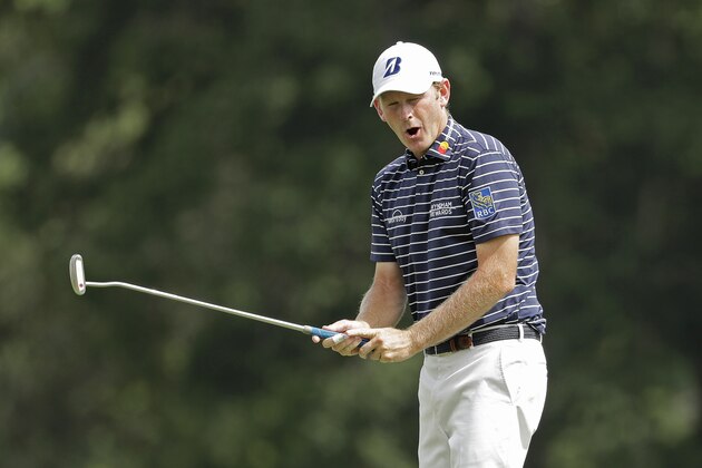 Brandt Snedeker reacts to missing a birdie putt on the ninth hole during the final round of the Wyndham Championship golf tournament at Sedgefield Country Club in Greensboro, N.C., Sunday, Aug. 19, 2018. (AP Photo/Chuck Burton)