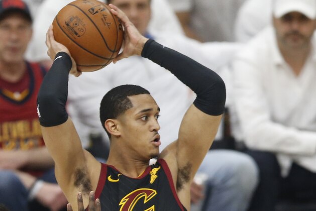 Cleveland Cavaliers' Jordan Clarkson (8) looks to pass against Boston Celtics' Terry Rozier (12) in the first half of Game 6 of the NBA basketball Eastern Conference finals, Friday, May 25, 2018, in Cleveland. (AP Photo/Ron Schwane)