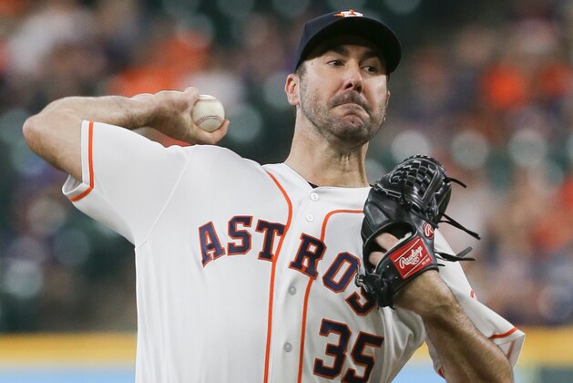 HOUSTON, TX - AUGUST 14:  Justin Verlander #35 of the Houston Astros pitches in the first inning against the Colorado Rockies at Minute Maid Park on August 14, 2018 in Houston, Texas.  (Photo by Bob Levey/Getty Images)