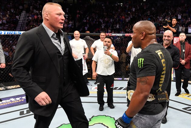 LAS VEGAS, NV - JULY 07:  Brock Lesnar confronts Daniel Cormier after his UFC heavyweight championship fight during the UFC 226 event inside T-Mobile Arena on July 7, 2018 in Las Vegas, Nevada.  (Photo by Josh Hedges/Zuffa LLC/Zuffa LLC via Getty Images)