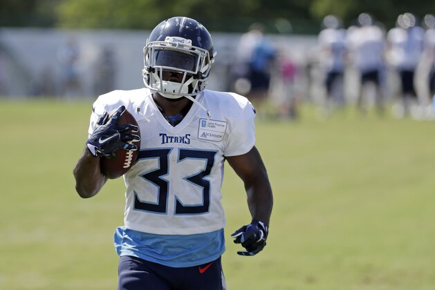 Tennessee Titans running back Dion Lewis runs the ball during NFL football training camp Sunday, July 29, 2018, in Nashville, Tenn. (AP Photo/Mark Humphrey)
