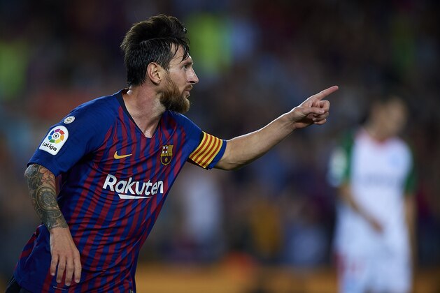 BARCELONA, SPAIN - AUGUST 18:  Lionel Messi of Barcelona celebrates after scoring the third goal during the La Liga match between FC Barcelona and Deportivo Alaves at Camp Nou on August 18, 2018 in Barcelona, Spain.  (Photo by Quality Sport Images/Getty Images)